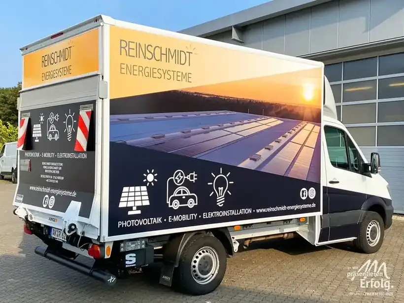 Reinschmidt LKW Heckansicht – Fahrzeugbeschriftung von Münch Werbetechnik Siegen